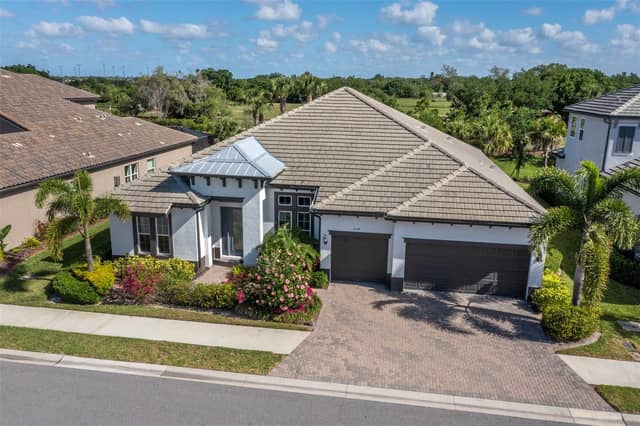 6129 LUNGO LAGO DR photo