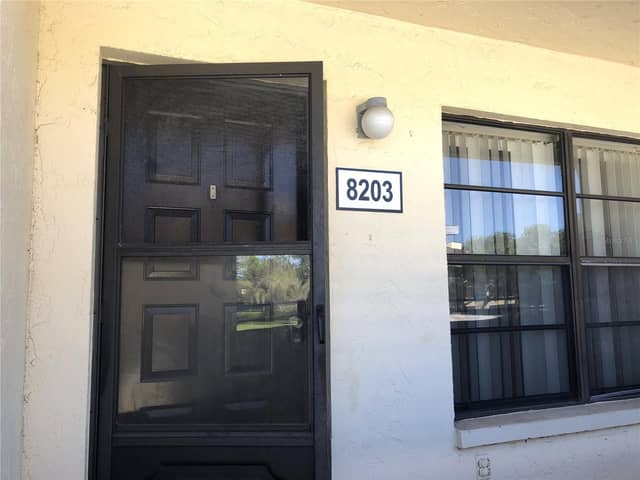 13608 S VILLAGE DR #8203 photo