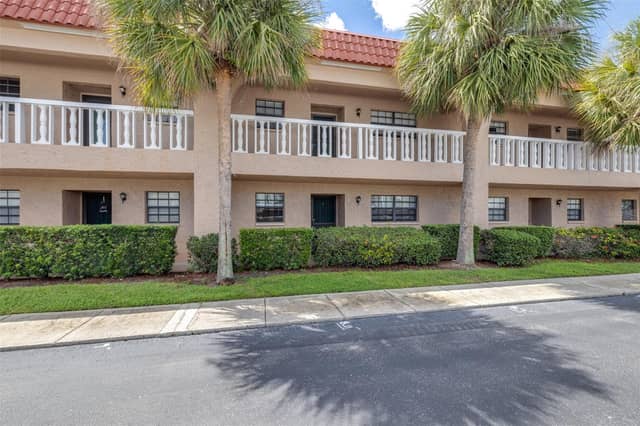 1750 BELLEAIR FOREST DR #A8 photo