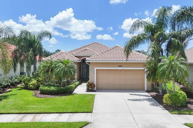 5641 WHISPERING OAKS DR photo