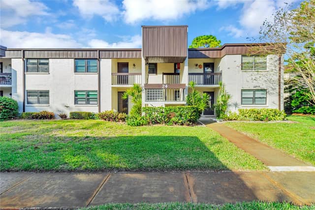 2400 WINDING CREEK BLVD #24-203 photo