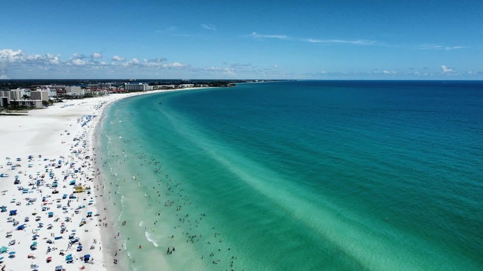 Aerial view of Siesta Key's white-sand beach and turquoise Gulf waters, Sarasota FL